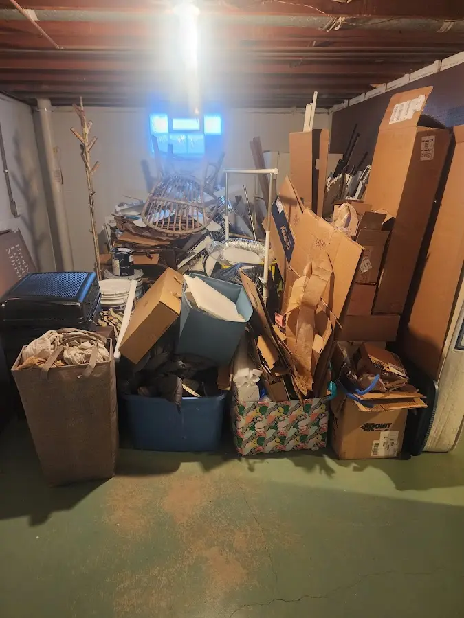 Roll-off dumpster container at job site for Yard Waste Dumpster Rental in Ashford